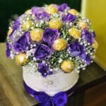 purple roses & ferrero rocher in a white box